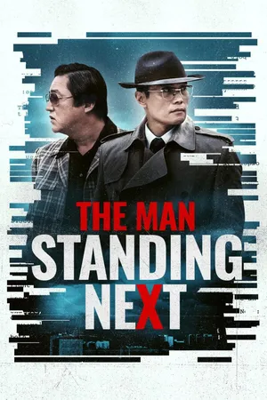 The Man Standing Next